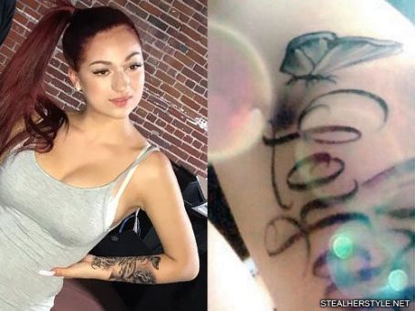 danielle with her arms on her waist 